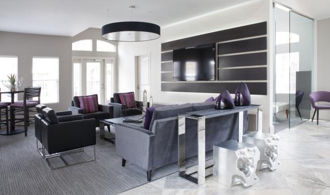 a spacious room with a couch and a table